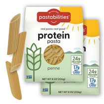 Front view of Protein Pasta Penne box with window and labels 24g protein and 17g net carbs, second box and loose penne on white