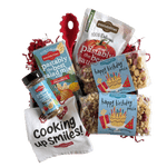 Angled view of Happy Birthday Pasta 14 oz bag showcasing cake- and present-shaped multicolored pasta on white background