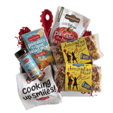 Front view of 14 oz bag of Cheerleading Pasta showcasing yellow label and tri-color cheerleader- and megaphone-shaped pasta on white background