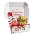 Front view of Baseball Pasta two-pack showcasing labeled 14 oz bags and tan baseball-shaped pasta on white background