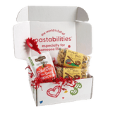 Front view of Baseball Pasta two-pack showcasing labeled 14 oz bags and tan baseball-shaped pasta on white background