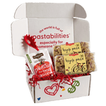 Front of two 14 oz Bicycle Pasta bags showing multicolored bicycle-shaped pasta in clear packaging on white