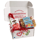 Front view of Happy Birthday Pasta 2-pack bag showcasing colorful birthday cake and present-shaped pasta on white background