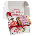Front view of Bunny Hop Pasta bag showcasing pink label with bunny illustration and multicolored bunny-shaped pasta on white background