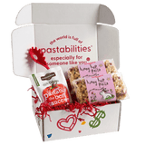 Front view of Bunny Hop Pasta bag showcasing pink label with bunny illustration and multicolored bunny-shaped pasta on white background