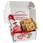 Front view of two 14 oz Fall Harvest Pasta bags showing leaf- and pumpkin-shaped tri-color pasta on white background
