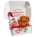 Front view of two 14 oz Halloween Pasta bags with orange label and pumpkin, ghost, and spiderweb-shaped pasta on white