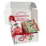 Front view of Hearts & Flowers Pasta 14 oz bag showing red heart and yellow flower-shaped noodles on white background