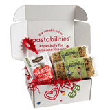 Front view of Lacrosse Pasta 2-pack showing green and tan lacrosse-shaped noodles and product label on white background