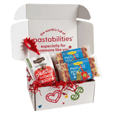 Front view of Music City Pasta bag showcasing red and yellow guitar and musical-note shaped pasta on white background
