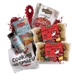 Front of Naughty or Nice Pasta 14 oz bag showcasing mixed holiday-shaped pasta with red label on white background