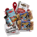 Angled view of Pirate Pasta 14 oz bag showcasing blue pirate label with skull artwork and red and yellow novelty-shaped pasta on white background