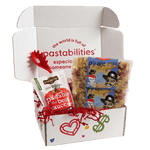Angled view of Pirate Pasta 14 oz bag showing pirate-themed blue packaging and red and yellow pasta on white background