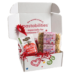 Front view of Princess Pasta 2-pack showing pink Princess Pasta label and crown- and castle-shaped noodles on white background