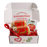 Front view of two 14 oz bags of Reindeer Pasta showcasing multicolored reindeer-shaped pasta and red label on white background