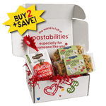 Angled view of Mah Jongg pasta gift box showcasing a pasta bag and sauce pouch with a white gift box background