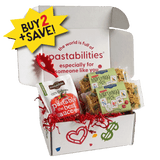 Angled view of Mah Jongg pasta gift box showcasing a pasta bag and sauce pouch with a white gift box background