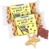 Front view of American Pride Pasta showing star and flag-shaped red and yellow pasta and label on white background